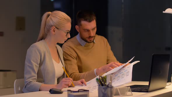 Business Team Working on Ui Design at Night Office