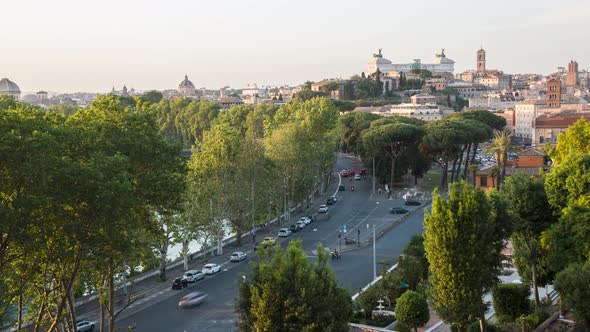 Timelapse of traffic at sunset in the City of Rome, with the Vittoriano on the backround