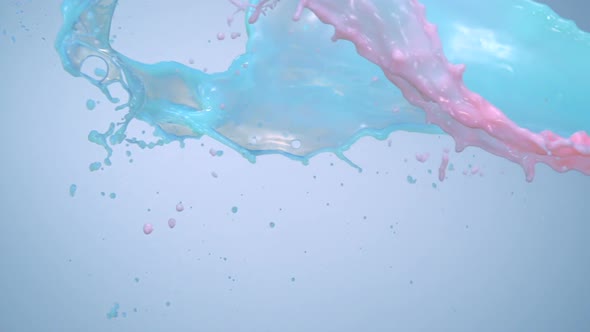 Milky green and pink liquid splash, Slow Motion