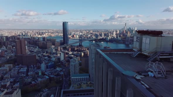 Forwards Fly Around Top of High Rise Building