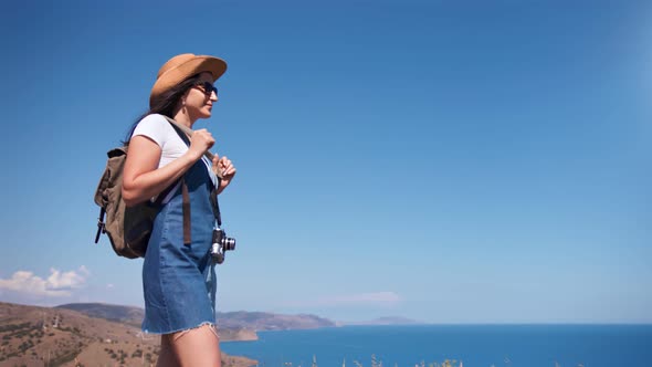 Smiling Touristic Woman Enjoying Trekking Admiring Beautiful Nature Sea and Sky Landscape