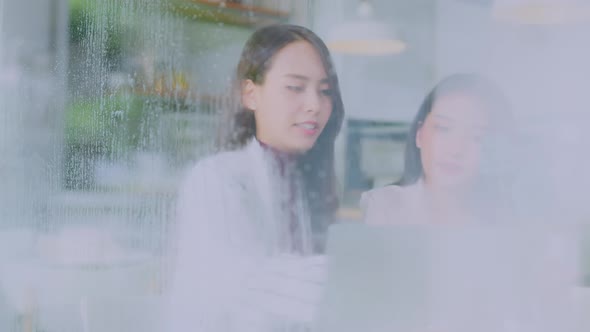 asian female talking good positive conversation to friends with smiling laugh and happiness