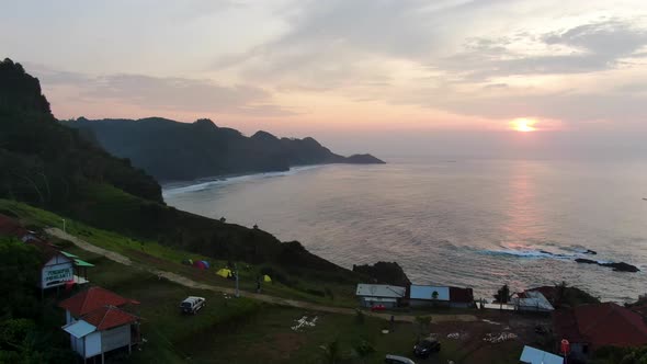 Scenic aerial panorama of tropical Menganti coast, Java, Indonesia on sunrise