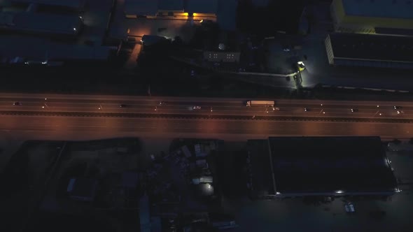 Top down Aerial view of the night highway with cars in the city 14