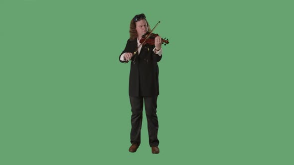 A Violinist in a Black Suit and Original Glasses on His Head Plays the Violin Masterly