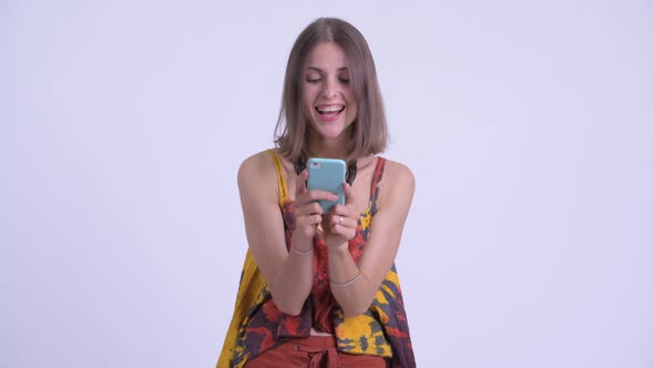 Happy Young Beautiful Hipster Woman Using Phone