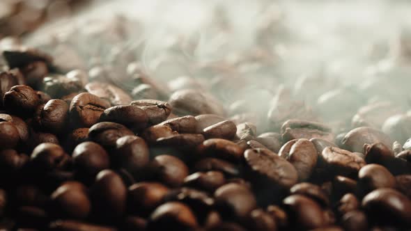 Rotating Roasted Coffee Machine with Smoke Coming Out From Beans