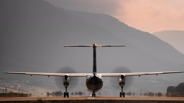 Propellor Airplane Taxiing And Taking Off From Runway