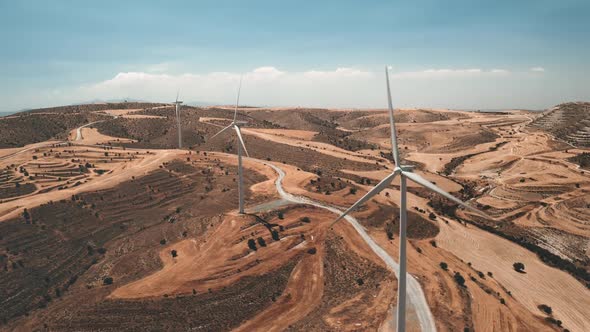 Wind Mill Turbines Farm on Dry Yellow Hills