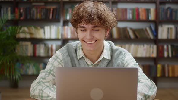 Attractive Student Man Using Laptop Search Information Internet Course Study Online e Learning in