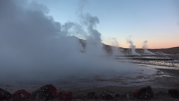 Chile. Atacama Desert. Valley of geysers. El Tatio geysers steaming