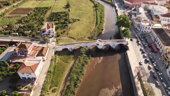 Slow flyover of the historic arch bridge in Silves, Portugal