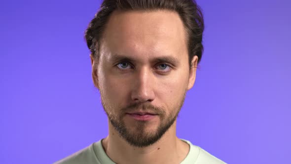 Portrait of Serious European Man Looking to Camera