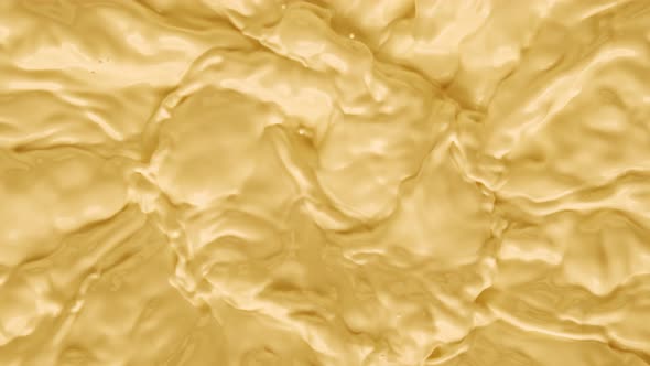 Super Slow Motion Shot of Swirling Yellow Milky Wortex at 1000Fps