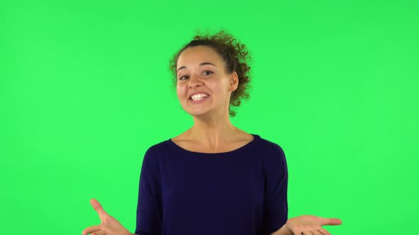 Portrait of Curly Woman with Shocked Wow Face Expression. Green Screen