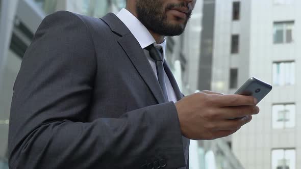 Businessman Using Smartphone Outdoors, App for Busy People, To-Do List Reminder