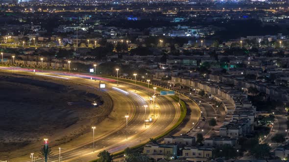 Aerial View to Villas and Houses with Golf Course Night Timelapse