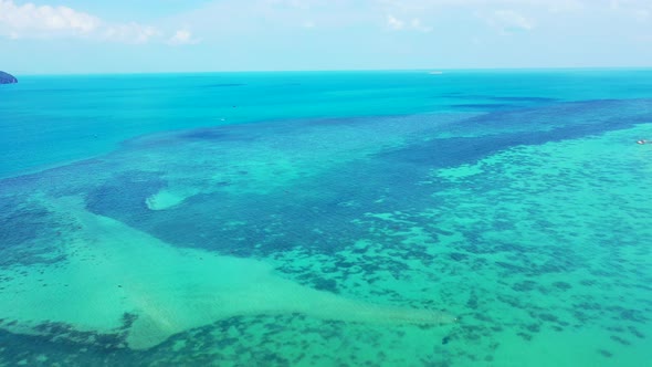 Luxury overhead abstract shot of a sandy white paradise beach and blue sea background in high 