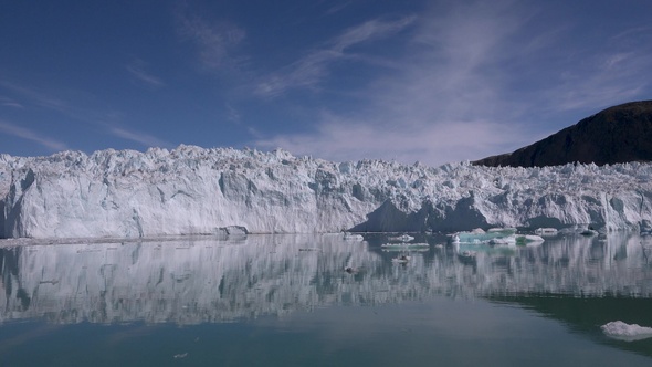 Ilulissat, Greenland. Massive icebergs floating near the shores of a glacier.