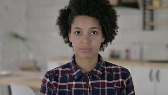 Portrait of African American Woman Get Surprise at Camera