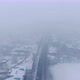 Aerial view of small town in snowfall. Blizzard. Snowstorm. - VideoHive Item for Sale