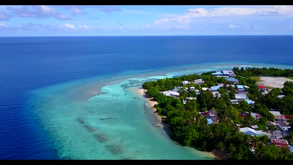 Aerial drone view seascape of paradise island beach lifestyle by clear lagoon with white sand backgr