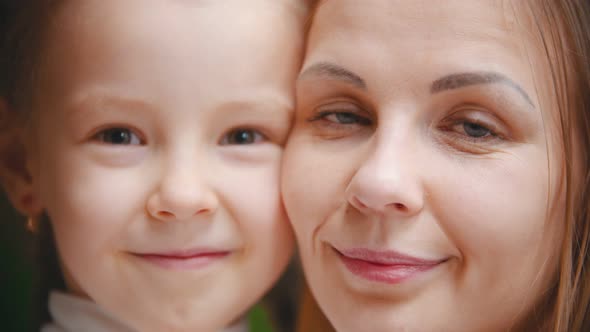 Two Caucasian Women - Mother and Daughter - Smiling