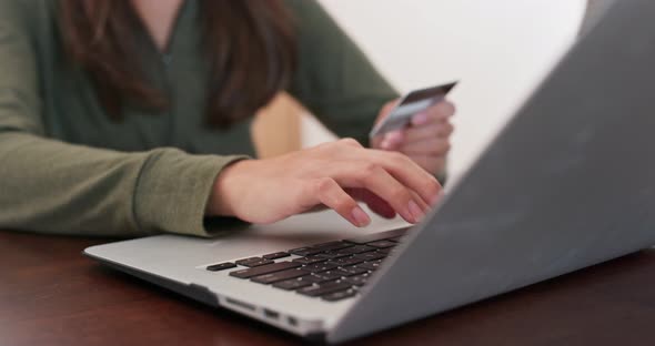 Woman work on laptop computer at home