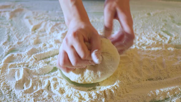 Close Up Making Dough By Female Hands at Bakery
