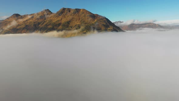 Aerial view of Unalaska Bay with fog on Unalaska island, Alaska, United States.