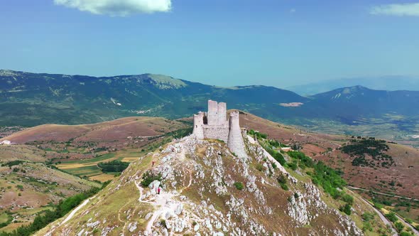 Aerial View of Ancient Castle on Mountain Hill Pine Forest on Mountain Slope