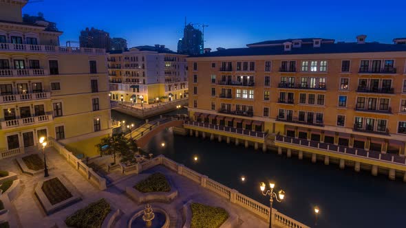 Canal Aerial Top View in Venicelike Qanat Quartier of the Pearl Precinct of Doha Day to Night