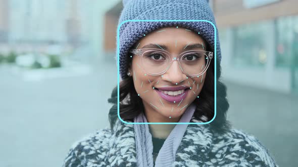 Face Detection. Futuristic and Technological Scanning of Young Female Face