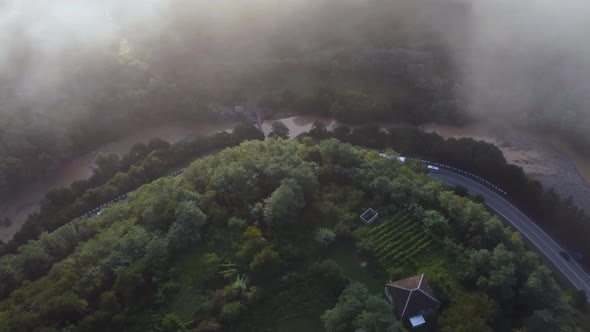 Truck And Cars On Highway From Clouds Above In The Mountain Valley