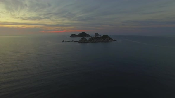 View From a Drone To a Beautiful Island in the Triozerie Bay at Sunrise