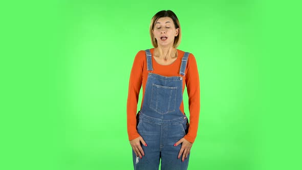 Upset Girl Shrugs and Shakes Her Head Negatively. Green Screen