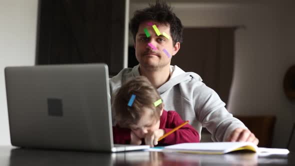 Father with a son try to work at home