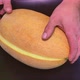 Slicing ripe melon with a kitchen knife. - VideoHive Item for Sale
