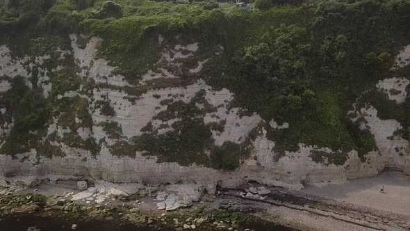 Beer chalk cliffs. Aerial upwards shot. United Kingdom.