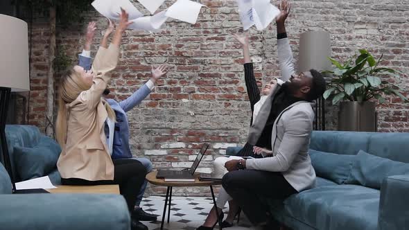 Business People Team Throwing Up Work Papers Celebrate Corporate Success and Victory