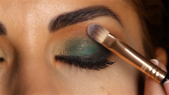 Girl with an Evening Make Up with Closed Eyes, Make Up Brush Tints Eyelid