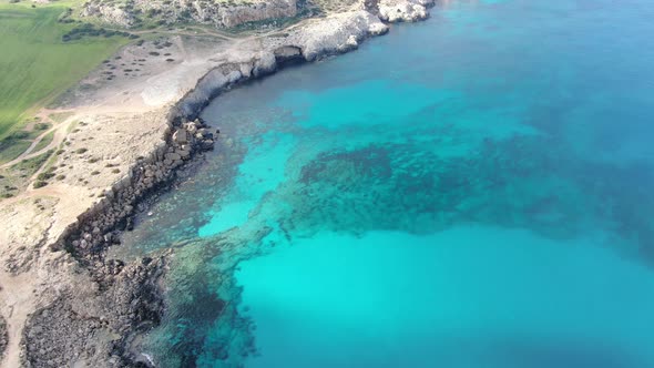 Wide Shot of Turquoise Sea Lagoon on Cyprus Resort. Aerial View of Transparent Water of