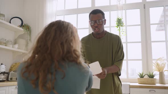 Black Man Yells at His Girlfriend and Shakes Checks at Home