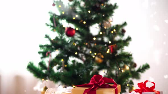 Gift Boxes on Sheepskin Near Christmas Tree