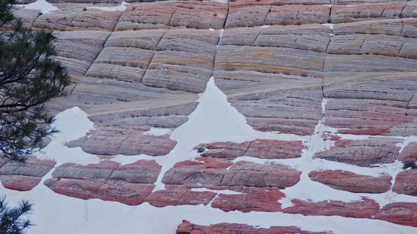 Checkerboard pattern on mesa in Zion with snow in the rocks patterns