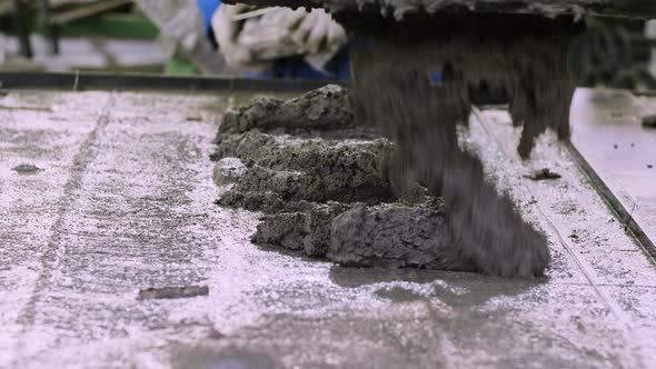 Slurry being grout by mechanism