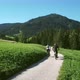 Two people cycling in landscape, Alta Badia, Italy - VideoHive Item for Sale