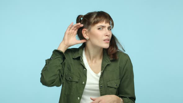 Slow Motion of Funny Caucasian Woman with Double Ponytail Hairstyle Cant Hear you Leaning Closer