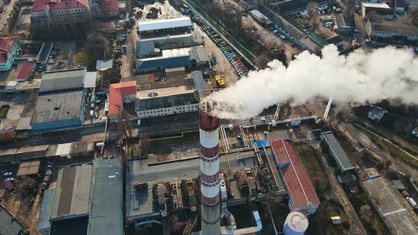 Aerial drone view of Chisinau. Thermal station with smoke coming out of the tub