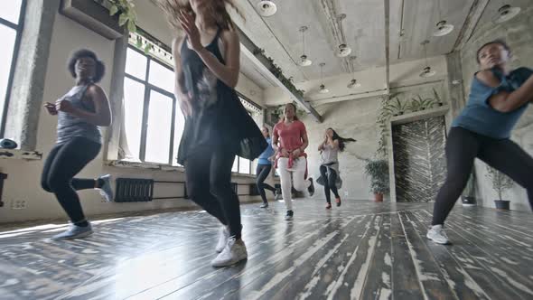 Young Women Doing Aerobics